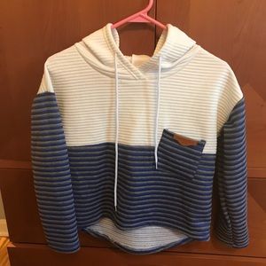 Cropped light sweater